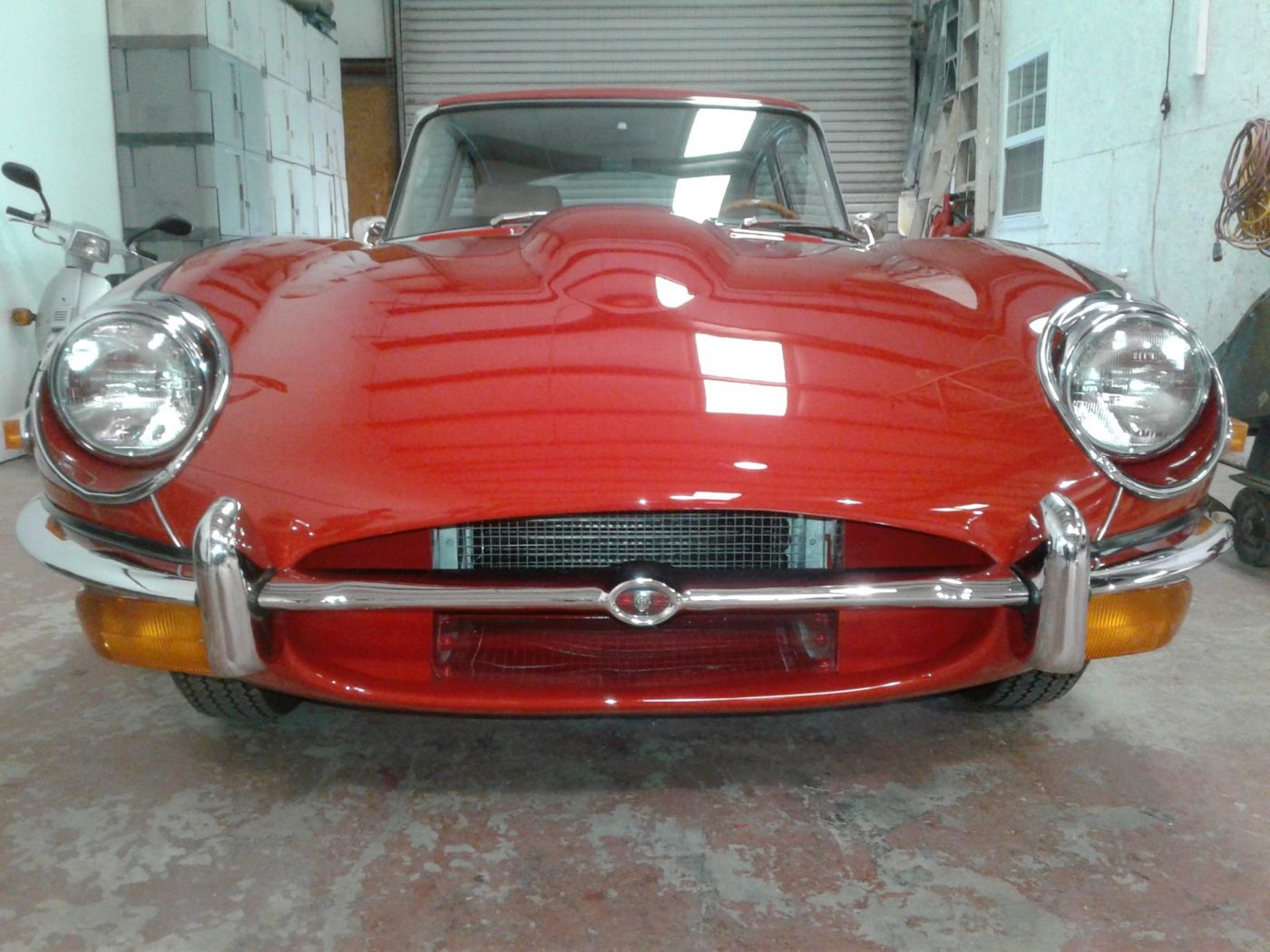 A restored red Jaguar E-Type at Auto Restore Atlanta